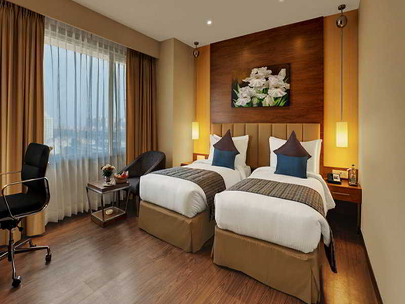 Ramada Ahmedabad Hotell Rom bilde